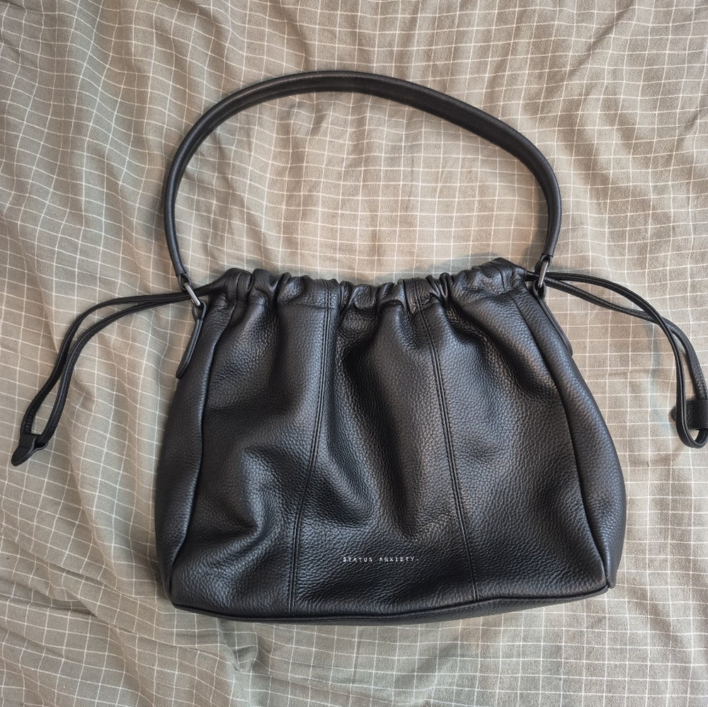 Status Anxiety Point Of No Return Drawstring Bag